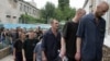 Tubercular patients at a penal colony in the Ukrainian village of Zhdanovka, in the Donetsk region, line up to enter the canteen.