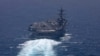 A US Navy handout photo released on May 7 shows the aircraft carrier USS George H.W. Bush sailing in the Arabian Sea. 