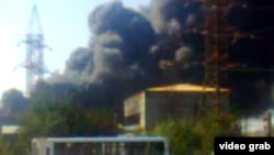 Smoke rises from a plant in the city of Sumgayit after at least two explosions. 