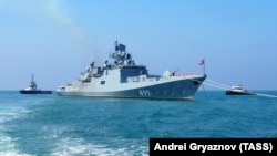 The Admiral Makarov frigate takes part in Russian Navy Day celebrations at the port of Tartus, Syria, on July 26.