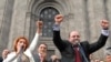 Armenia -- Heghine Bisharian (L) and other leaders of the Orinats Yerkir Party sing at a campaign rally in Yerevan.