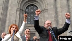 Armenia -- Heghine Bisharian (L) and other leaders of the Orinats Yerkir Party sing at a campaign rally in Yerevan.