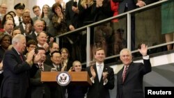 U.S. Secretary of State Rex Tillerson waves before delivering remarks to State Department employees in Washington on February 2.