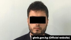 Кармалган киши. 