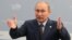 President Vladimir Putin gestures as he speaks at a meeting with G20 leaders St. Petersburg.