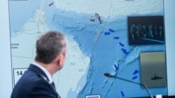 US General Dan Caine, chairman of the Joint Chiefs of Staff, speaks as a map of the Strait of Hormuz is displayed.