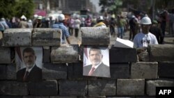 Supporters of the Muslim Brotherhood rallied on July 5 in support of ousted Egyptian President Muhammad Morsi.