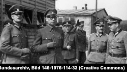 General Vlasov (second from left) poses with members of the ROA army in 1944, just south of Berlin.