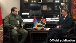 Afghanistan - Afghan Defense Minister Tariq Shah Bahrami (R) meets with his Armenian counterpart Davit Tonoyan in Kabul, November 19, 2018.