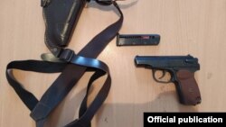 Шектүүлөрдөн алынган тапанча. 