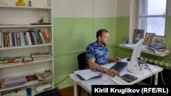 Евгений Доможиров на рабочем месте