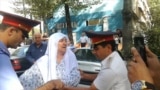 Mother Of Tajik Attack Suspect Pours Gasoline On Herself In Protest