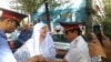 Mother Of Tajik Cyclist-Attack Suspect Douses Self With Gasoline In Protest