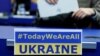 Таблічка з салідарнасьцю з Украінай перад экстраным паседжаньнем МАГАТЭ ў Вене, 2 сакавіка 2022