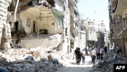 Սիրիա - Ռմբակոծությունների հետևանքով ավերված շենքեր Հալեպի արվարձաններից մեկում, արխիվ