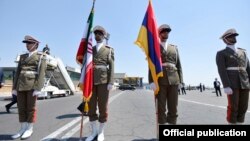 Iran - An Iranian honor guard displays Iranian and Armenian national flags at an official ceremony in Tehran, 7 August 2017.
