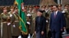 FILE: Afghan President Ashraf Ghani (2nd R) inspects the honor guards during a ceremony to introduce his new cabinet to the parliament in Kabul in January 2015.