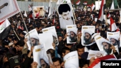 İraqda şiə ruhanisi Moqtada al-Sadr tərəfdarları Səudiyyədə Nimr al-Nimr-in edamına etiraz edir