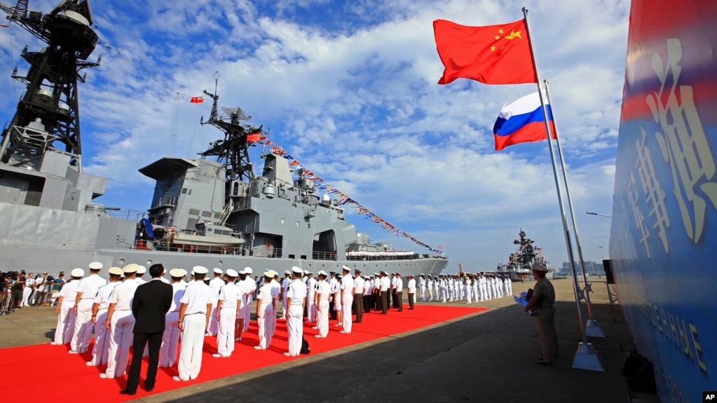 China's navy holds a welcome ceremony as a Russian naval ship arrives in Zhanjiang, southern China, in 2016.