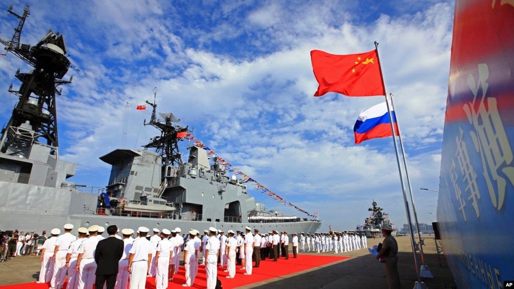 China's navy holds a welcome ceremony as a Russian naval ship arrives in Zhanjiang, southern China, in 2016.