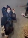 CCTV Video Shows Woman Kicked And Beaten By Iranian Security Forces
