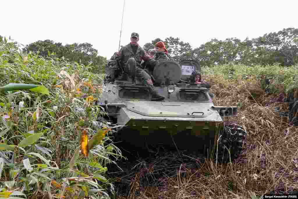 Around 100 people were enlisted for the expedition after reports that abandoned weaponry dating back to the war had been discovered in Iturup&rsquo;s dense jungle.