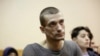 Russia – Artist Pyotr Pavlensky listens during a hearing at a courthouse in St.Petersburg, February 24, 2014