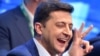 Volodymyr Zelensky reacts after the announcement of the first exit poll results in the second round of Ukraine's presidential election at his campaign headquarters. 
