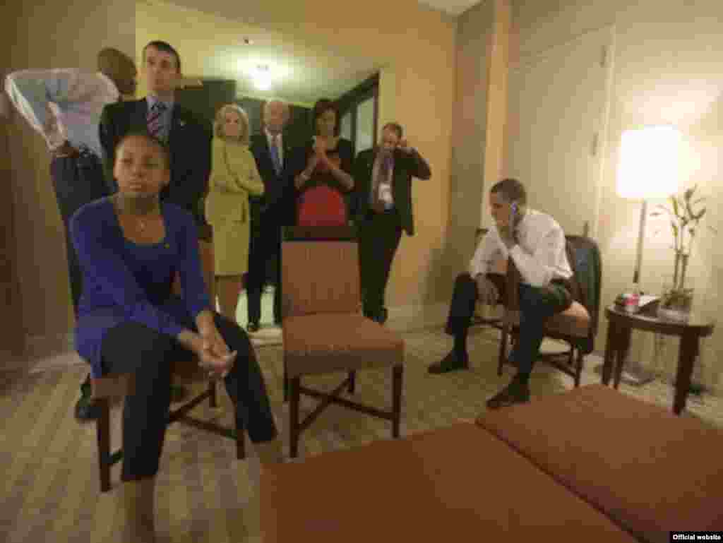 U.S. President-elect Barack Obama and his family watch the results come in on election night in Chicago on November 5. - obama10