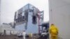 Napori da se vodom ohladi reaktor broj 4 u Fukušima Daići, 22. mart 2011.