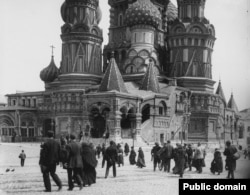 Russians with banners in front of St. Basil’s Cathedral on Red Square