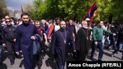 Armenia -- Priests lead marching opposition protesters in Yerevan, 22 April 2018.