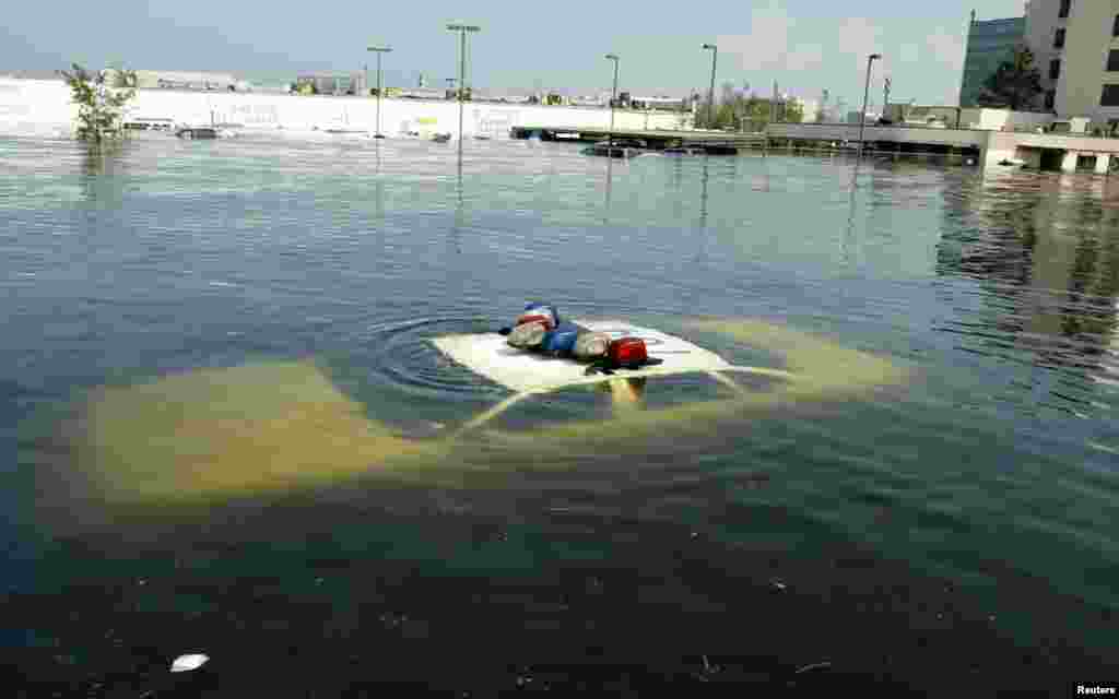 A police car is submerged in New Orleans on August 31.