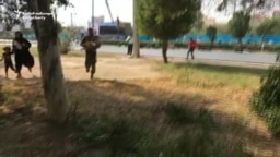 WATCH: State television said gunmen opened fire at the event, targeting a stand where Iranian officials were gathered to watch an annual military parade marking the start of the country's 1980-88 war with Iraq. 