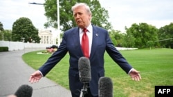 US President Donald Trump speaks to reporters from the South Lawn of the White House on May 8.