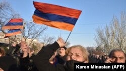 ARMENIA -- Opposition supporters rally outside the National Assembly building to demand Prime Minister Nikol Pashinian's resignation over his handling of last year's war with Azerbaijan, March 3, 2021