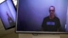 Алексей Навальный во время появления на судебном заседании по видеосвязи