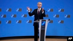 Secretary-General Jens Stoltenberg speaks during a media conference after a meeting of NATO defense ministers at NATO headquarters in Brussels on June 16.