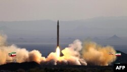 The test firing at an undisclosed location in Iran of a surface-to-surface Qiam missile in 2010