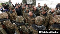 Armenia - Prime Minister Hovik Abrahamian talks to soldiers serving on the border with Azerbaijan, 30Dec2015.