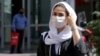 Face masks are now commonplace on the streets of Tehran as the Islamic republic continues to battle the MIddle East's deadliest outbreak of COVID-19. 