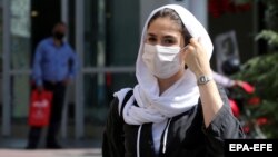 Face masks are now commonplace on the streets of Tehran as the Islamic republic continues to battle the MIddle East's deadliest outbreak of COVID-19. 