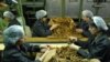 Armenia -- Workers at a tobacco fermentation factory in the southern town of Masis, undated.