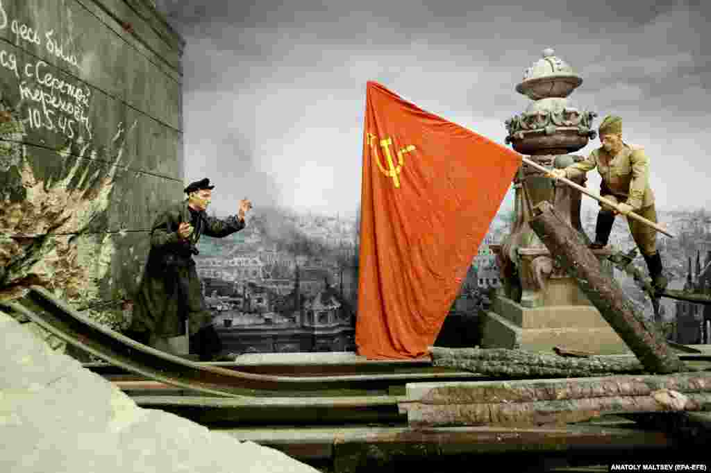 The famous moment Red Army soldiers were photographed on the roof of Germany’s Reichstag, recreated in the exhibition. In Russia, World War II remains a sacred memory. An estimated 22-28 million people -- some 14 percent of the population of the Soviet Union -- died during World War II.