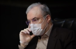 Iranian Health Minister Saeed Namaki condemned “illiterate charlatans and demagogues.”