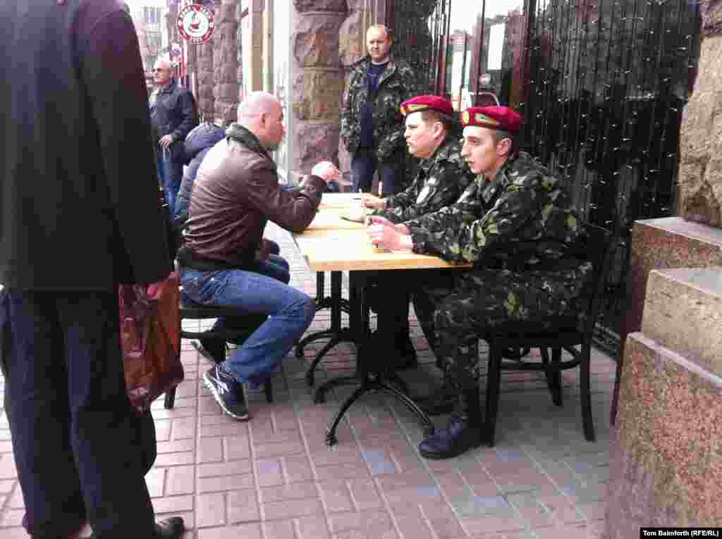 Men sign up for the National Guard in Kyiv