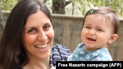 Iranian-British Nazanin Zaghari-Ratcliffe poses for a photograph with her daughter Gabriella, undated