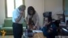 Armenia - Officials at the Vanadzor branch of the Rescue Service answer phone calls from anxious residents after an earthquake, 7Jul2014.