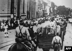Японские войска входят в Сайгон. 1941 год