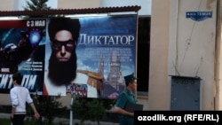 A poster for the film "The Dictator" on a street in the Uzbek capital, Tashkent